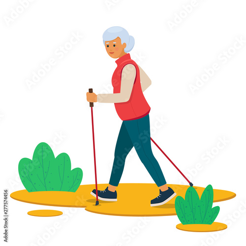 Senior woman nordic walking  in the nature