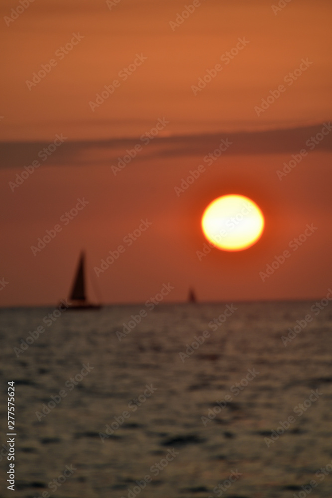 Red Sunset at the Beach with Boat Red Sunset at the Beach with Boat