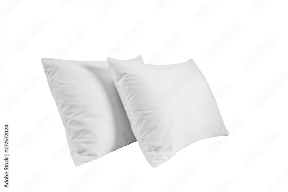Two white pillows isolated, pillows on a white background, two pillows piled against white background. Side view. Two white pillows isolated, pillows on a white background, two pillows piled against white background. Side view.