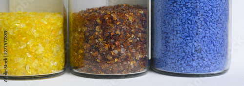 Jars of pulled cane and frit glass blowing supplies