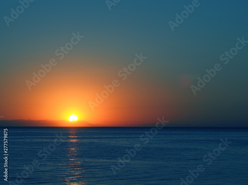 Dawn over the Mediterranean Sea. Romantic Sea Vacation © Sergey