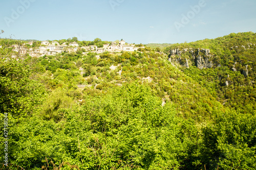 Ioannina village Vitsa in spring season old tranditional houses and green trees photo