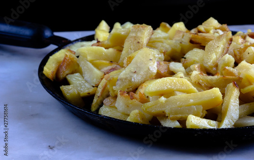 Fried potato on pan