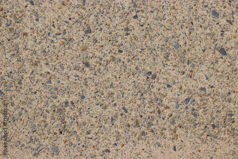 Beige stone pebble wall texture Beige stone pebble wall texture