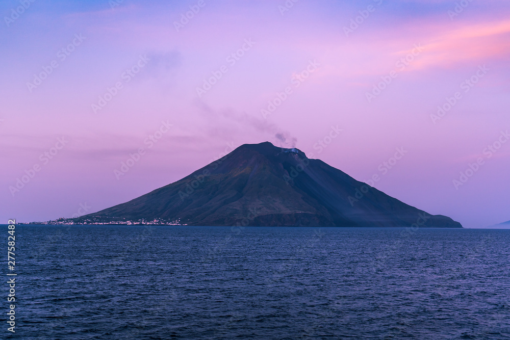 The majestic Eolian island of Stomboli view from the sea, active volcano in Italy