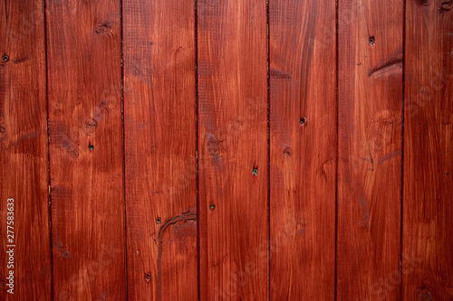 red stained wood gate pannel texture