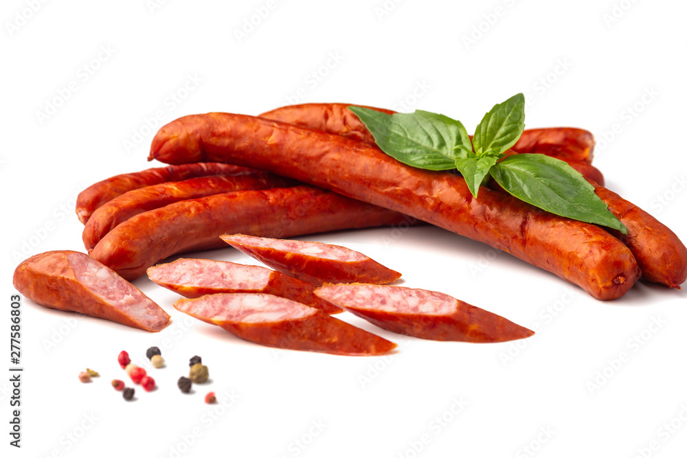 Smoked bratwurst Pork Sausages with basil leaves, close-up, isolated on white background. Smoked bratwurst Pork Sausages with basil leaves, close-up, isolated on white background.
