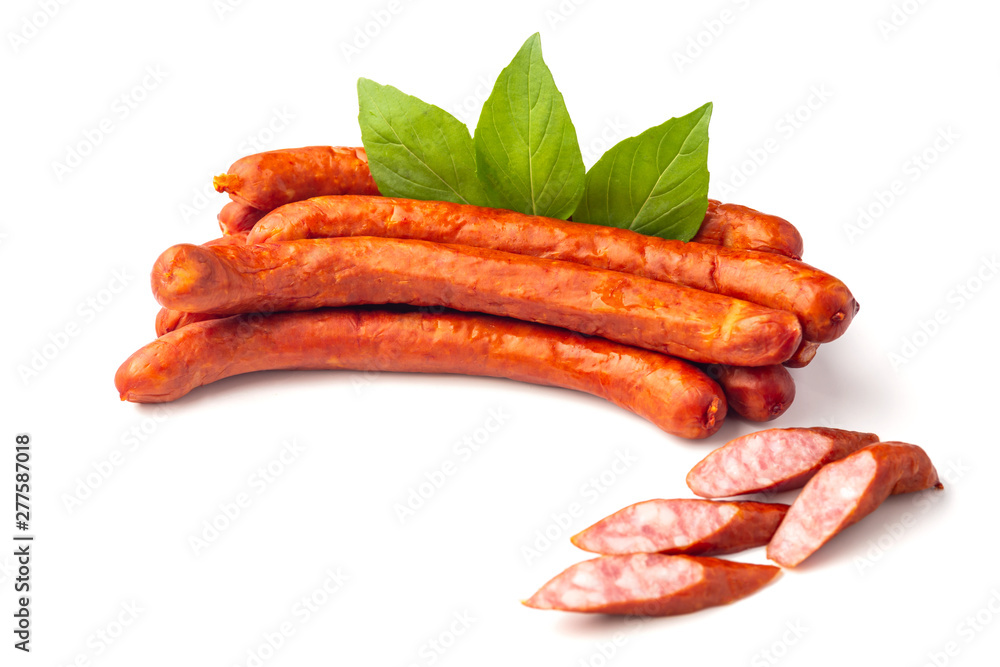 Dry smoked Sausages with basil leaves, macro, isolated on white background. Dry smoked Sausages with basil leaves, macro, isolated on white background.