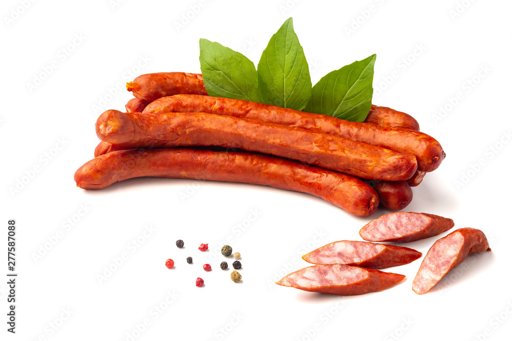 Dry smoked Sausages with basil leaves, macro, isolated on white background. Dry smoked Sausages with basil leaves, macro, isolated on white background.