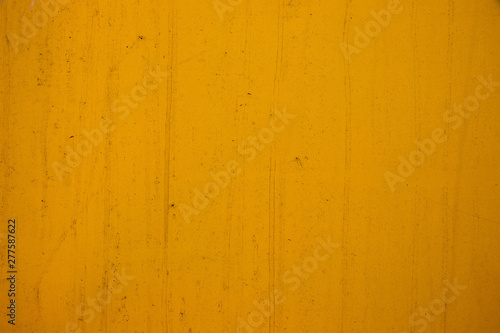 Yellow painted stained metal texture