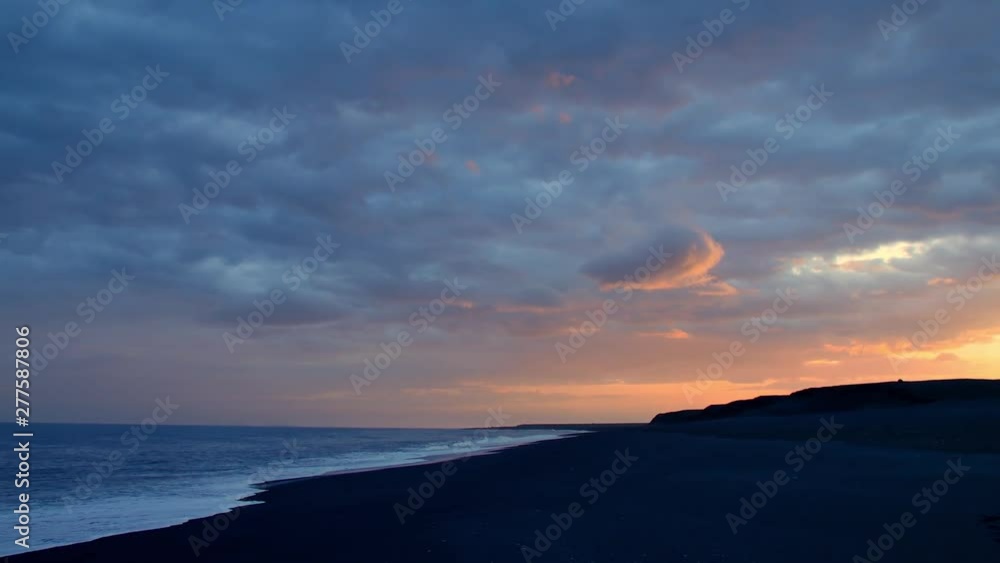 Black sand with white waves on the beach, Iceland Black sand with white waves on the beach, Iceland