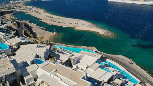 Aerial drone photo of new modern public port with car parking spaces in main town of Mykonos island, Cyclades, Greece