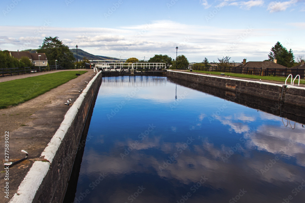 Caledonian Canal Locks in Inverness in Scotland. It is a 60miles long canal in Scotland that starts in Inverness and ends in Fort William connecting the east coast with the west coast.