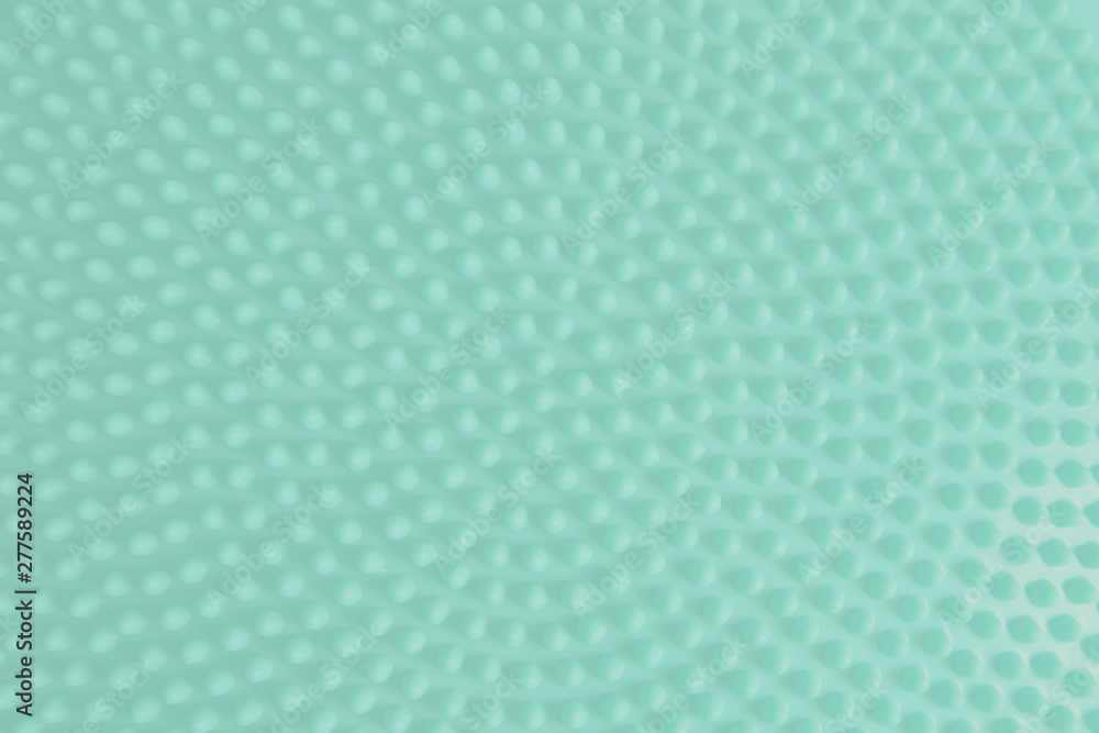 Color of year 2020 neo mint, round dotted pattern texture background.