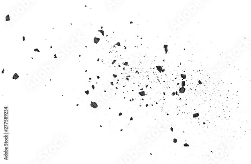 Black coal dust with fragments isolated on white background, top view. © domnitsky