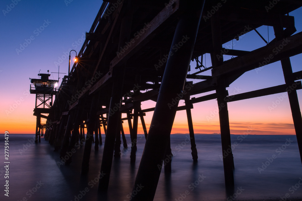 Sunset San Clemente Pier in California. It was built in 1928 with a length of about 395 meters. Sunset San Clemente Pier in California. It was built in 1928 with a length of about 395 meters.