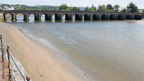 The medieval bridge over the river Taw at Barnstaple, England. Known as the Barnstaple Long Bridge, it is founded on sixteen arches and is officially classified as an ancient monument  © pjhpix