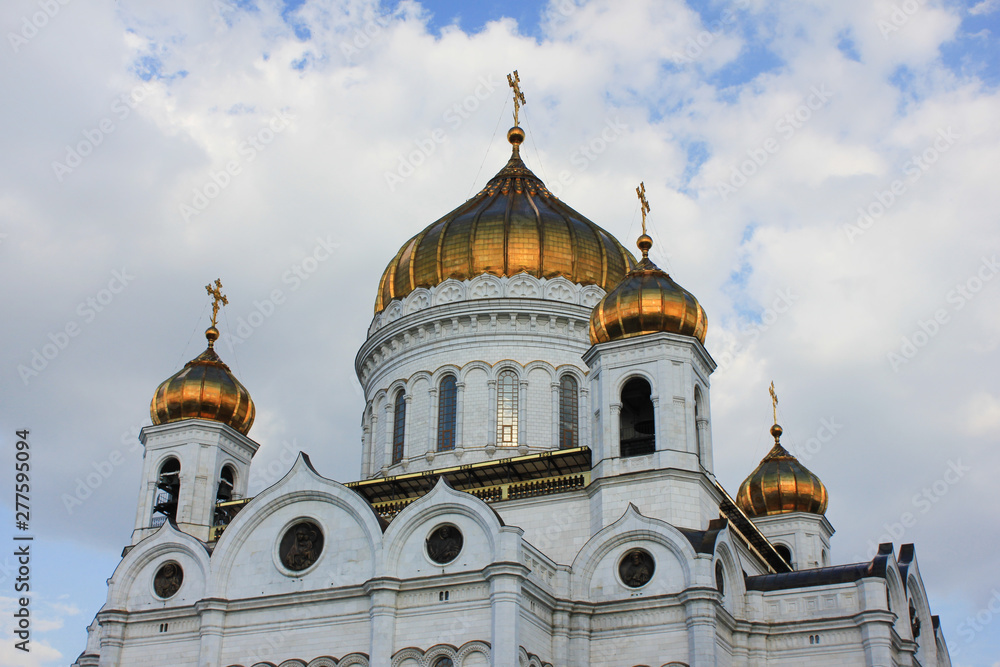 Cathedral of Christ the Saviour in Moscow, Russia. Orthodox church in Moscow city center close up view of facade with golden domes