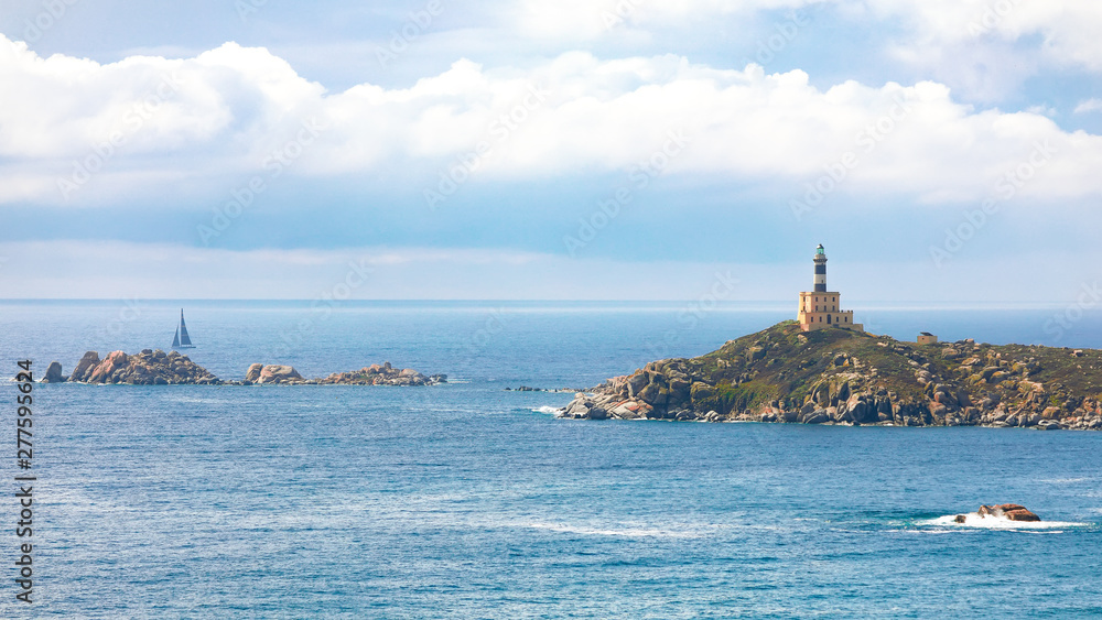 Fantastic view of Capo Carbonara lighthouse with turquoise water.