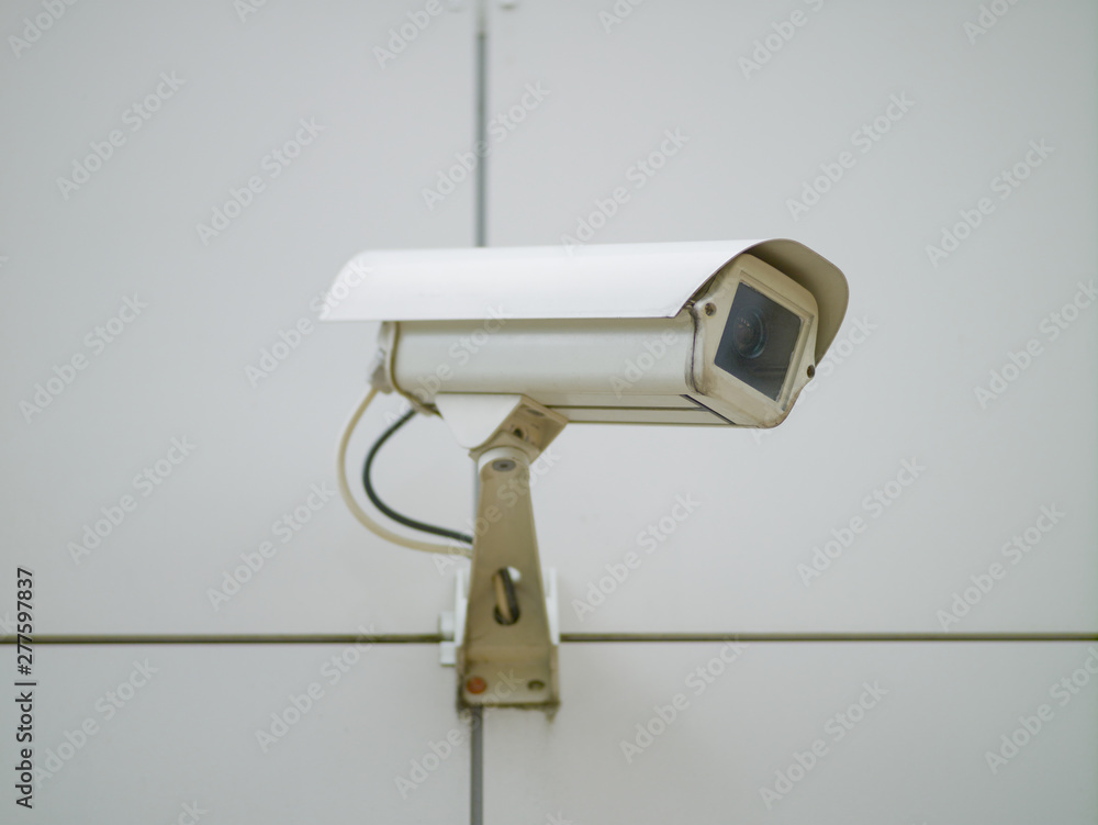 Outdoor surveillance camera mounted on the wall