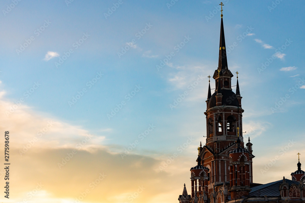 Gothic Orthodox Cathedral. Neo-Gothic Orthodox Church with Masonic symbols. Church at sunset.