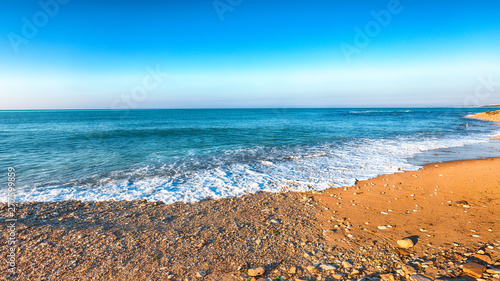 Fototapeta Naklejka Na Ścianę i Meble -  Fantastic view azure sea glowing by sunlight
