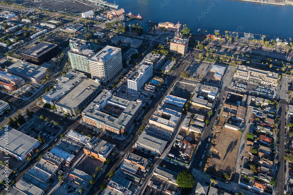Afternoon aerial view of downtown San Pedro buildings and waterfront in Los Angeles, California. Afternoon aerial view of downtown San Pedro buildings and waterfront in Los Angeles, California.