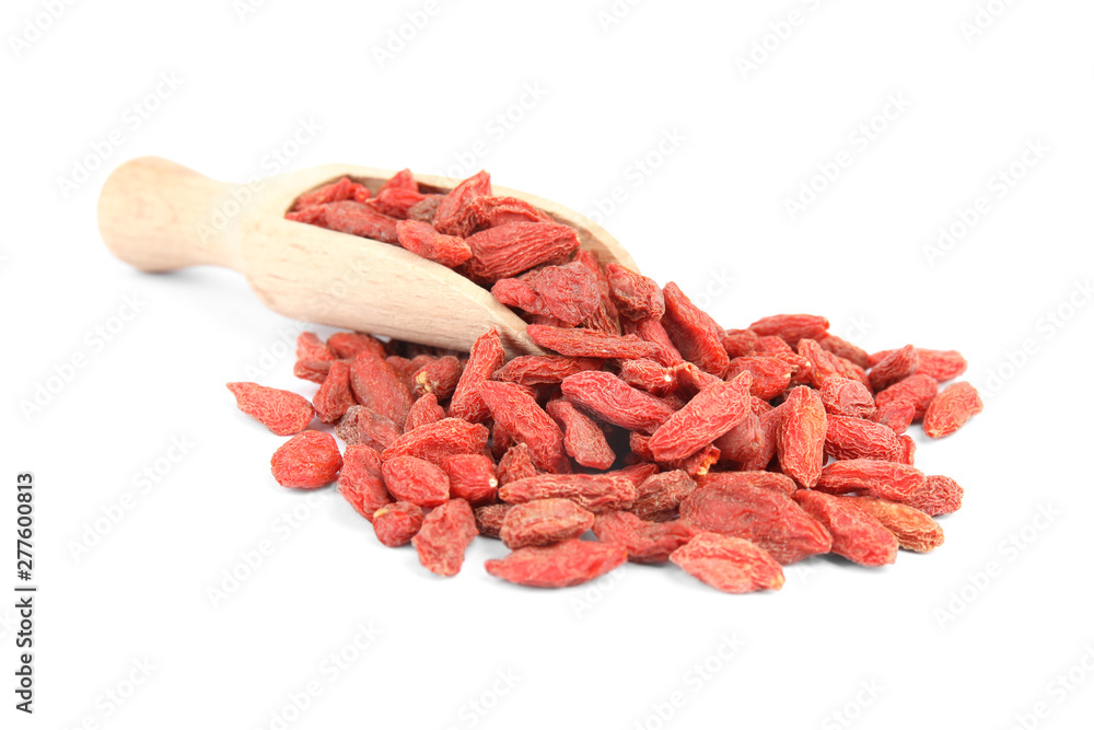 Wooden scoop with dried goji berries on white background Wooden scoop with dried goji berries on white background
