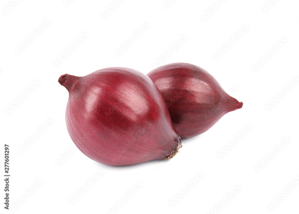 Fresh whole red onions on white background