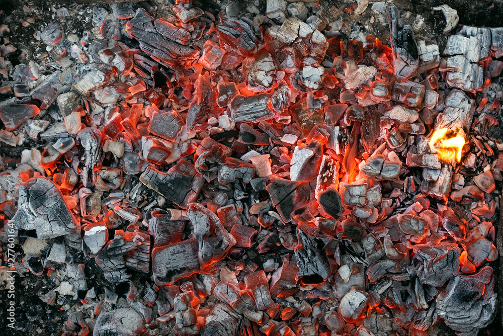 Burning coals texture of bonfire abstract background. Burning coals texture of bonfire abstract background.