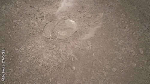 Mud volcano bledug kuwu. aerial view volcanic plateau with geothermal activity and geysers, Indonesia java. aerial view volcanic landscape photo