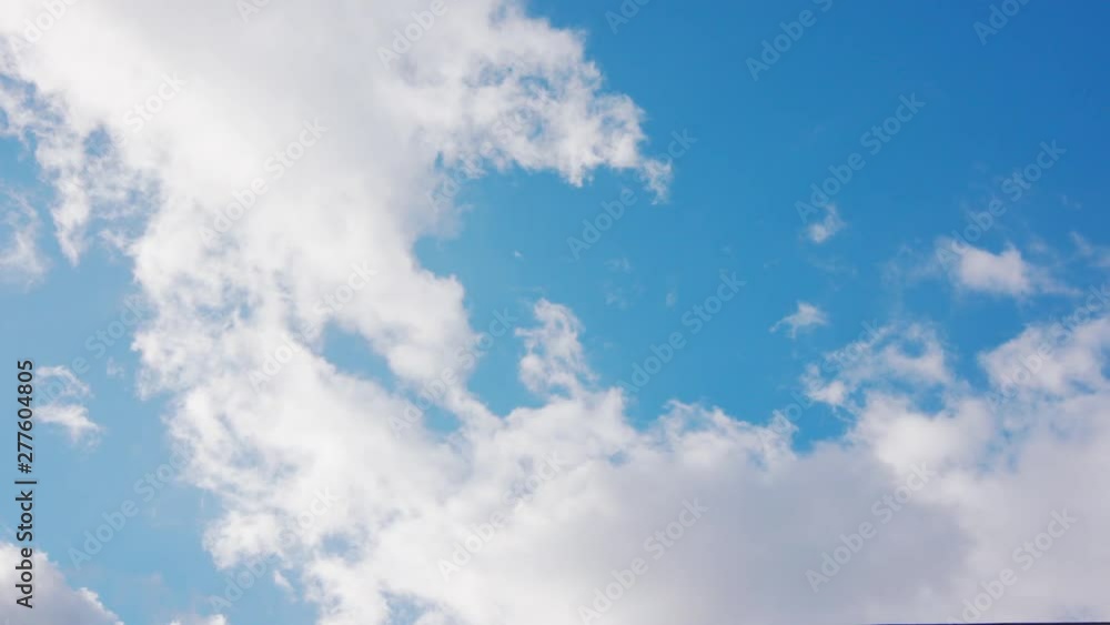 White clouds floating in the blue sky. White clouds floating in the blue sky.