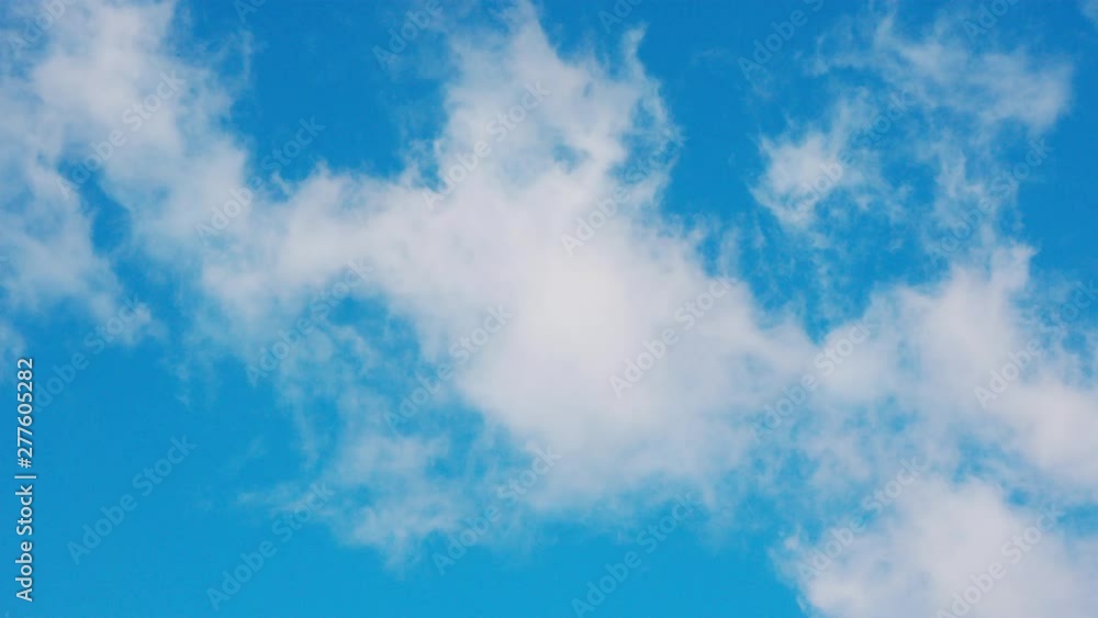 White clouds floating in the blue sky. White clouds floating in the blue sky.