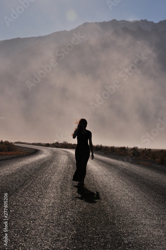 Silhouette Woman Road Wind Dust Desert Backlit