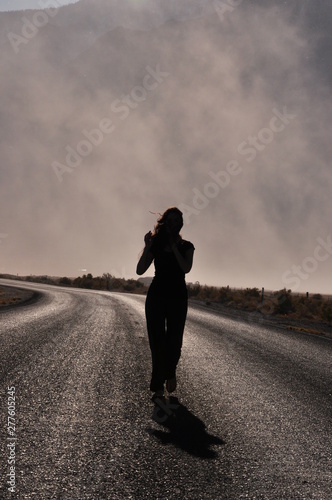 Silhouette Woman Road Wind Dust Desert Backlit