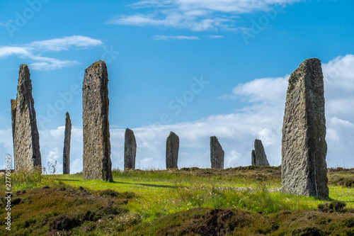 The Ring of Brodgar is a Neolithic henge and stone circle about 6 miles north-east of Stromness on the Mainland, the largest island in Orkney, Scotland.  photo