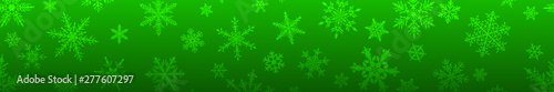 Christmas banner of complex big and small snowflakes in green colors. With horizontal repetition