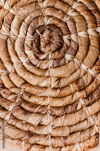 Latin American artisan crafts. Handmade rustic craft concept. Base for hot cooking pots made of vegetable fiber.