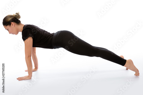 Phalakasana yoga pose (plank pose). Yoga poses woman isolated with white background. Yoga pose set. Mindfulness and Spiritually concept. Girl practicing Hatha Yoga asanas