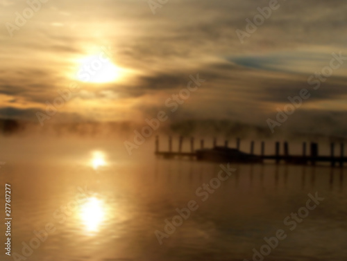 Lake and boat at dawn