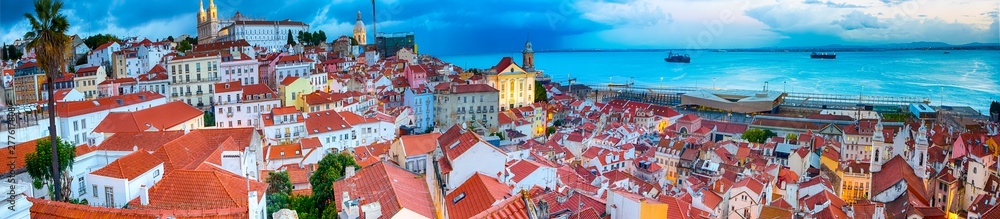 Panoramic Image of The Oldest Alfama District in Lisbon in Portugal. Townscape Scenery Was Made During a Blur Hour.