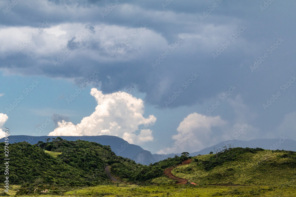 Urubici, Santa Catarina, Brazil - January 29, 2019: The beautiful landscape of the white raven mountain shortly before a summer storm. Urubici, Santa Catarina, Brazil - January 29, 2019: The beautiful landscape of the white raven mountain shortly before a summer storm.