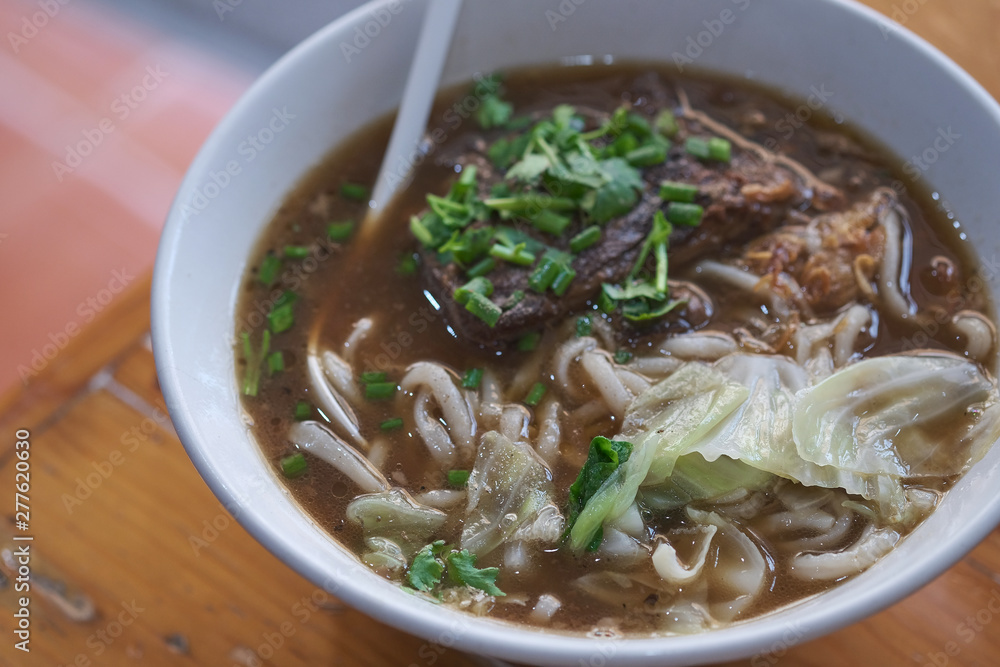 Taiwanese food of soup noodles with pork ribs cakes at restaurant Taiwanese food of soup noodles with pork ribs cakes at restaurant
