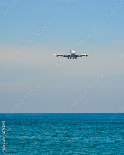 Airplane landing at Phuket Airport (Thailand)