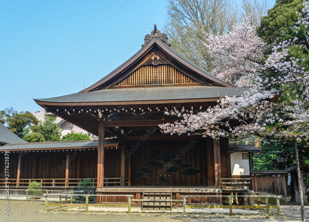 Ancient temple with cherry flowers