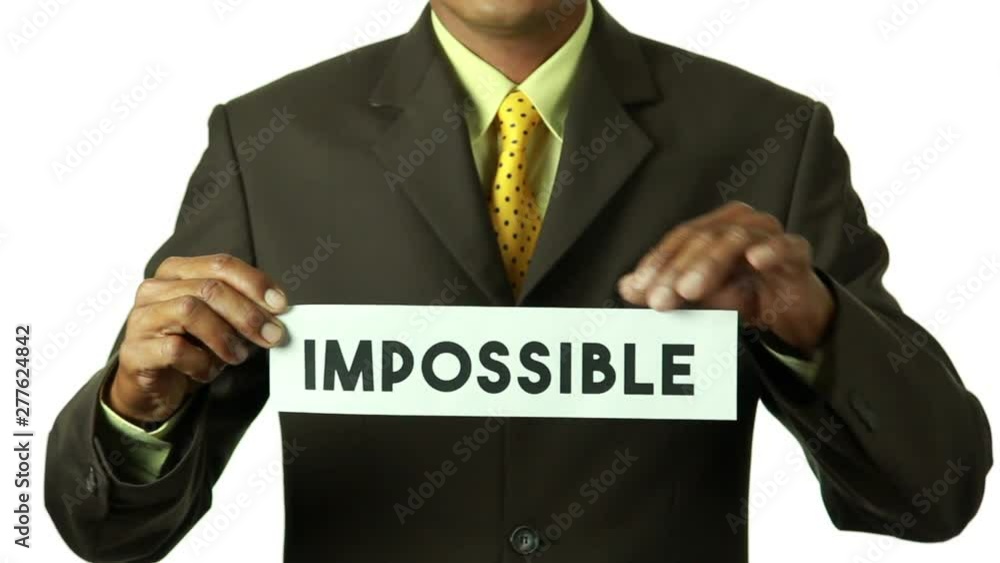 Businessman cut the paper for turning word Businessman cut the paper for turning word