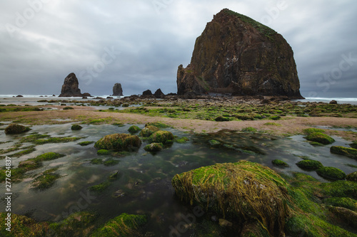 Cannon Beach is a city in Clatsop County, Oregon, United States, dramatic weather before a rain storm, tourism, Travel USA, sand, landscape, cityscape
