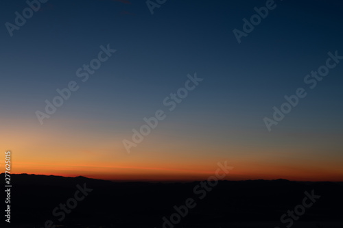Mountain panorama during sunrise. Beautiful natural panoramic landscape in the summer time © EKKAPON