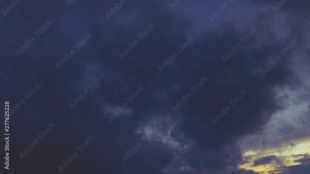 Dark sky time lapse with clouds. Puffy, fluffy clouds on closeup sky Dark sky time lapse with clouds. Puffy, fluffy clouds on closeup sky