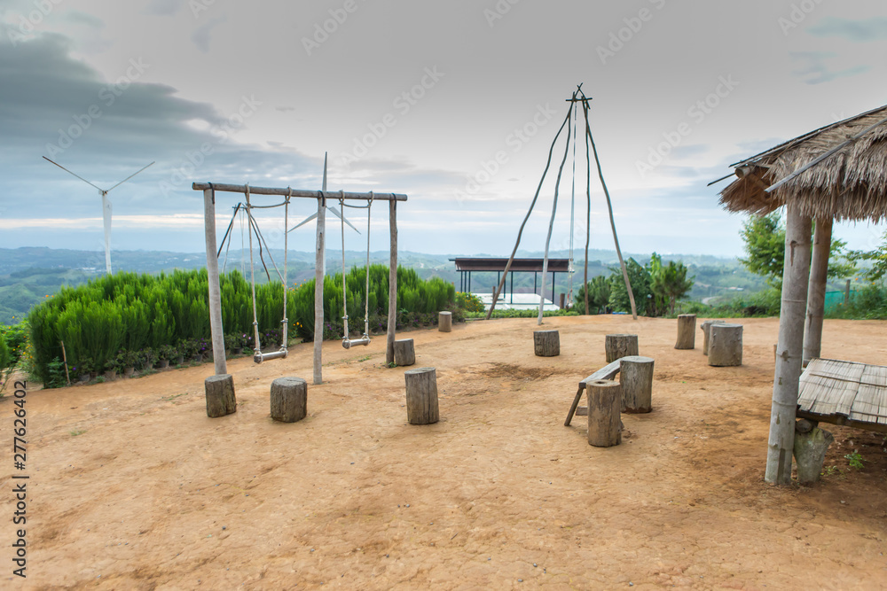 Fototapeta premium Wooden swings, sky background images
